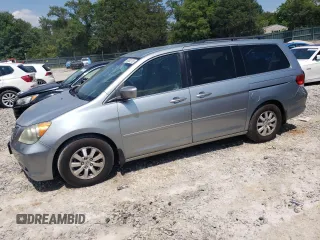 2010 Honda Odyssey EX with VIN 5FNRL3H50AB003273, listed as a Copart auction lot 63632755 with 129,126 mi miles and Salvage title. Bid and sale history available at DreamBid. Image 1.