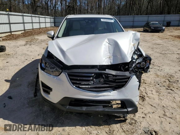 2016 Mazda CX-5 Grand Touring with VIN JM3KE4DY6G0857197, listed as a Copart auction lot 44500955 with 76,088 mi miles and Salvage Title. Bid and sale history available at DreamBid. Image 5.