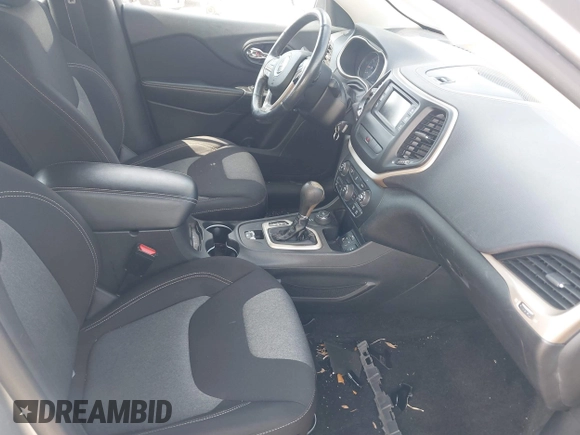 2015 Jeep Cherokee Sport with VIN 1C4PJMAB5FW533972, listed as a IAAI auction lot 41865291 with 106,063 mi miles. Bid and sale history available at carsss.com. Image 5.