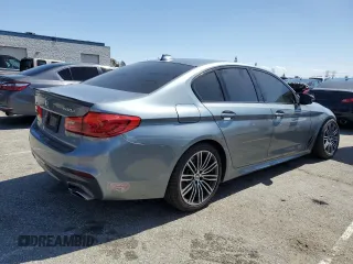 2020 BMW 5 Series 530e with VIN WBAJA9C06LCE66990, listed as a Copart auction lot 48823925 with 57,673 mi miles and Salvage Title. Bid and sale history available at DreamBid. Image 3.