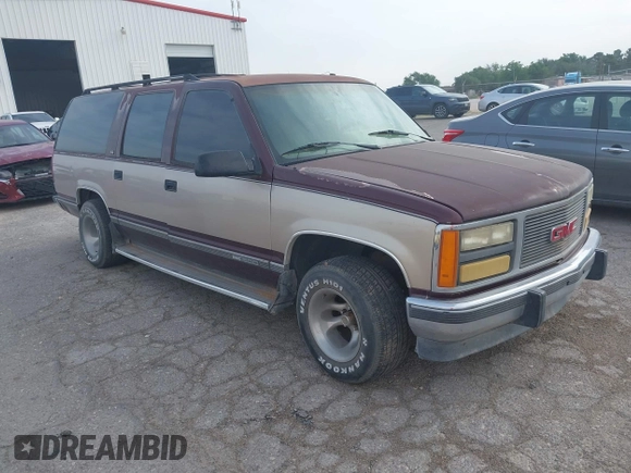 1993 GMC Suburban with VIN 1GKEC16KXPJ734150, listed as a IAAI auction lot 42114021 with 254,501 mi miles and . Bid and sale history available at DreamBid. Image 1.