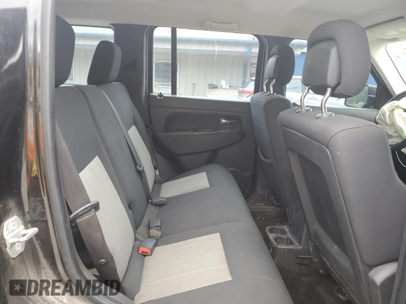 2010 Jeep Liberty Sport with VIN 1J4PN2GK8AW100147, listed as a Copart auction lot 63013305 with 161,400 mi miles and Salvage title. Bid and sale history available at DreamBid. Image 11.