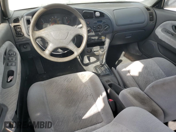 2001 Mitsubishi Mirage ES z VIN JA3AY26CX1U030593, wystawiony jako Copart lot #83749264 z przebiegiem 107 641 mil mil oraz Szkoda całkowita • Salvage title. Historia ofert i sprzedaży dostępna na DreamBid. Obrazek 8.