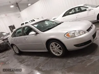 2013 Chevrolet Impala LTZ with VIN 2G1WC5E37D1241848, listed as a IAAI auction lot 41863719 with 167,482 mi miles. Bid and sale history available at carsss.com. Image 13.