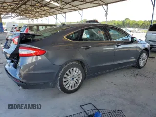 2015 Ford Fusion SE Hybrid with VIN 3FA6P0LU5FR218454, listed as a Copart auction lot 60682065 with 218,668 mi miles and Salvage title. Bid and sale history available at DreamBid. Image 3.