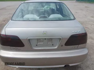 2000 Honda Civic LX with VIN 1HGEJ6670YL030749, listed as a IAAI auction lot 42112694 with 153,903 mi miles. Bid and sale history available at carsss.com. Image 16.
