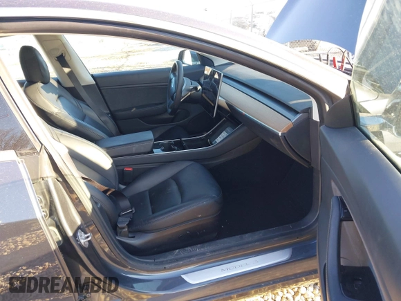 2020 Tesla Model 3 Long Range with VIN 5YJ3E1EB9LF795408, listed as a IAAI auction lot 41735428 with 56,013 mi miles. Bid and sale history available at carsss.com. Image 5.