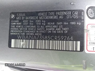 2005 BMW 5 Series 530i with VIN WBANA73585CR59264, listed as a IAAI auction lot 41567613 with Not Provided miles and . Bid and sale history available at carsss.com. Image 9.