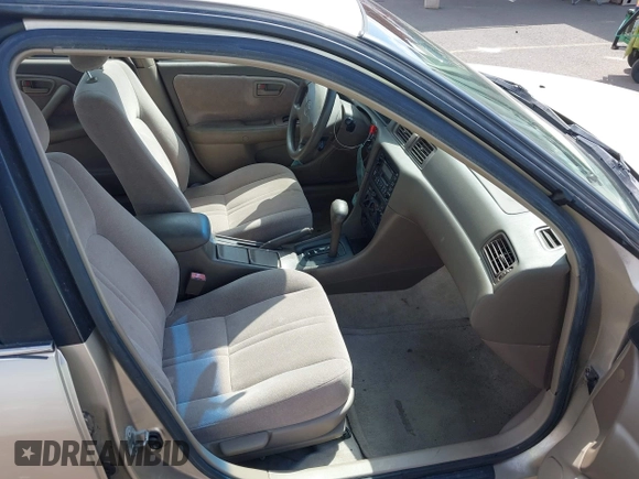 1999 Toyota Camry LE z VIN JT2BF22K9X0222119, wystawiony jako IAAI lot #41529258 z przebiegiem 119 919 mil mil oraz . Historia ofert i sprzedaży dostępna na DreamBid. Obrazek 5.