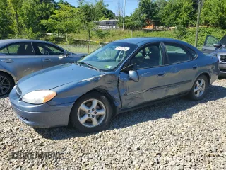 2001 Ford Taurus SE with VIN 1FAFP53U61A161763, listed as a Copart auction lot 43317165 with 64,025 mi miles and Salvage title. Bid and sale history available at DreamBid. Image 1.