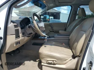 2010 Nissan Titan SE with VIN 1N6BA0ED1AN323167, listed as a Copart auction lot 60237535 with 135,182 mi miles and Salvage title. Bid and sale history available at DreamBid. Image 7.