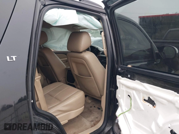 2014 Chevrolet Tahoe LT z VIN 1GNSCBE04ER143872, wystawiony jako IAAI lot #41377204 z przebiegiem 119 533 mil mil oraz . Historia ofert i sprzedaży dostępna na DreamBid. Obrazek 8.
