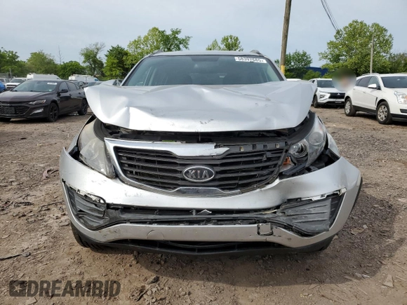 2012 Kia Sportage LX z VIN KNDPB3A29C7264856, wystawiony jako Copart lot #58397685 z przebiegiem 144 621 mil mil oraz Szkoda całkowita • Salvage title. Historia ofert i sprzedaży dostępna na DreamBid. Obrazek 5.