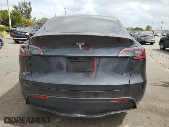 2025 Tesla Model Y Long Range with VIN 7SAYGDED6SF228626, listed as a Copart auction lot 47654525 with 2,087 mi miles and Salvage Title. Bid and sale history available at DreamBid. Image 6.