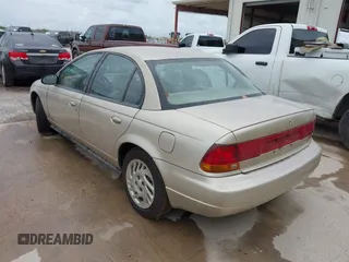 1998 Saturn SL with VIN 1G8ZK5275WZ142402, listed as a IAAI auction lot 42534417 with 181,283 mi miles and . Bid and sale history available at DreamBid. Image 3.