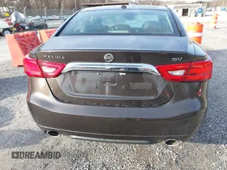2016 Nissan Maxima SL z VIN 1N4AA6AP9GC385718, wystawiony jako IAAI lot #41099349 z przebiegiem 108 841 mil mil oraz . Historia ofert i sprzedaży dostępna na DreamBid. Obrazek 16.