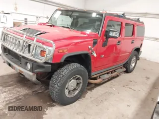 2004 Hummer H2 with VIN 5GRGN23U24H114730, listed as a IAAI auction lot 41605451 with 122,658 mi miles. Bid and sale history available at carsss.com. Image 2.