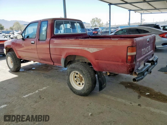 1990 Toyota Pickup DLX z VIN JT4VN13D5L5037936, wystawiony jako Copart lot #57442565 z przebiegiem 311 903 mil mil oraz Czysty tytuł • Clean title. Historia ofert i sprzedaży dostępna na DreamBid. Obrazek 2.