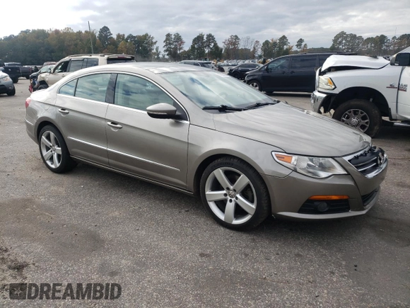 2011 Volkswagen CC Lux Plus with VIN WVWHN7AN1BE709436, listed as a Copart auction lot 77959964 with 165,213 mi miles and Salvage Title. Bid and sale history available at carsss.com. Image 4.