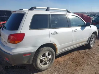 2003 Mitsubishi Outlander LS with VIN JA4LZ31G73U073339, listed as a IAAI auction lot 41517186 with 203,898 mi miles. Bid and sale history available at carsss.com. Image 4.