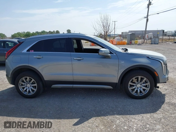 2023 Cadillac XT4 AWD Premium Luxury with VIN 1GYFZDR47PF163923, listed as a IAAI auction lot 42136236 with 52,012 mi miles and . Bid and sale history available at DreamBid. Image 13.
