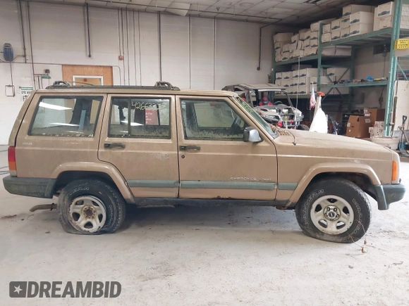 1999 Jeep Cherokee Sport with VIN 1J4FF68S0XL506805, listed as a IAAI auction lot 42663325 with 317,008 mi miles and . Bid and sale history available at DreamBid. Image 14.