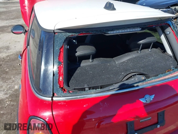 2009 MINI Hardtop S with VIN WMWMF73589TT95974, listed as a IAAI auction lot 41617775 with Not provided miles and . Bid and sale history available at DreamBid. Image 6.