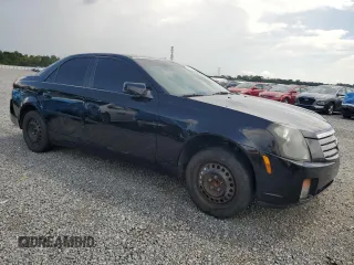 2004 Cadillac CTS with VIN 1G6DM577X40105370, listed as a Copart auction lot 58203715 with 135,391 mi miles and Salvage title. Bid and sale history available at DreamBid. Image 4.