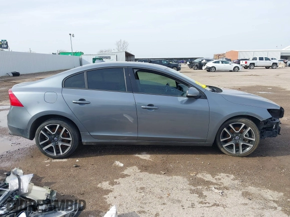 2017 Volvo S60 Dynamic with VIN YV126MFL4H2430687, listed as a IAAI auction lot 41577059 with 57,027 mi miles. Bid and sale history available at carsss.com. Image 14.