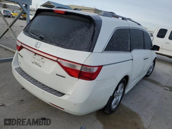 2012 Honda Odyssey Touring with VIN 5FNRL5H91CB047042, listed as a Copart auction lot 82248004 with 123,445 mi miles and Salvage Title. Bid and sale history available at carsss.com. Image 3.