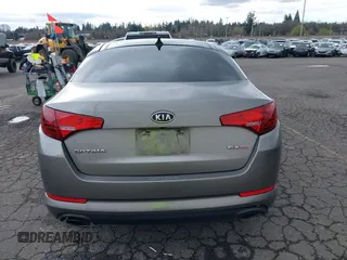 2012 Kia Optima EX with VIN 5XXGN4A76CG022770, listed as a IAAI auction lot 41825939 with 214,445 mi miles. Bid and sale history available at carsss.com. Image 16.