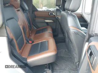 2023 Ford Bronco with VIN 1FMDE5BH3PLA90591, listed as a IAAI auction lot 42127867 with 34,616 mi miles and . Bid and sale history available at DreamBid. Image 8.
