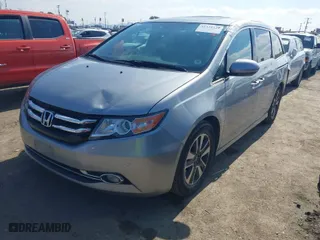2016 Honda Odyssey Touring Elite with VIN 5FNRL5H90GB139183, listed as a IAAI auction lot 41534324 with 93,807 mi miles. Bid and sale history available at carsss.com. Image 2.