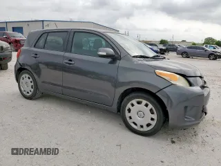 2010 Scion xD with VIN JTKKU4B40AJ057260, listed as a Copart auction lot 55053855 with 169,794 mi miles and Salvage Title. Bid and sale history available at DreamBid. Image 4.