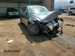 2021 Volkswagen Tiguan SE z VIN 3VV2B7AX3MM032467, wystawiony jako Copart lot #59904945 z przebiegiem Nie podano mil oraz Szkoda całkowita • Salvage title. Historia ofert i sprzedaży dostępna na DreamBid. Obrazek 13.
