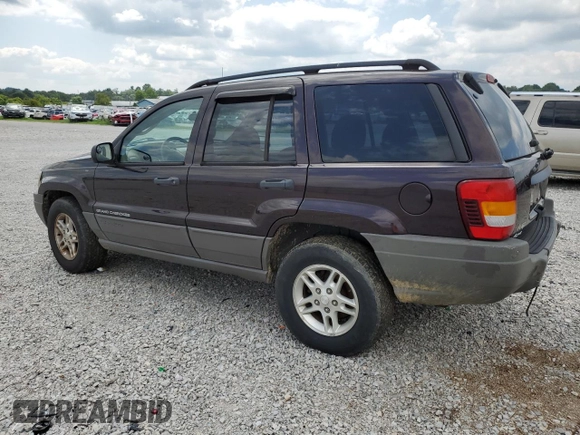 2004 Jeep Grand Cherokee Laredo with VIN 1J4GW48S64C121057, listed as a Copart auction lot 67765474 with 166,359 mi miles and Salvage title. Bid and sale history available at DreamBid. Image 2.