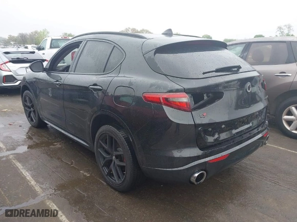 2021 Alfa Romeo Stelvio Ti with VIN ZASPAKBN9M7D09213, listed as a IAAI auction lot 41812289 with 38,410 mi miles. Bid and sale history available at carsss.com. Image 3.