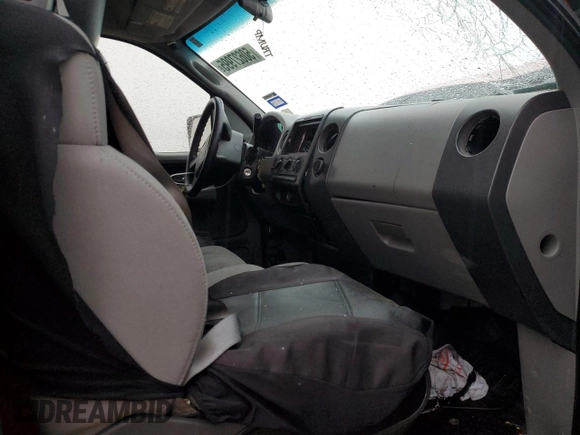 2007 Ford F-150 XL with VIN 1FTRF12257KC92124, listed as a Copart auction lot 50627995 with 142,316 mi miles and Salvage title. Bid and sale history available at DreamBid. Image 10.