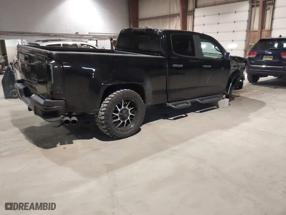 2018 Chevrolet Colorado 4WD Work Truck with VIN 1GCGTBENXJ1268300, listed as a IAAI auction lot 41276225 with 76,555 mi miles. Bid and sale history available at carsss.com. Image 4.