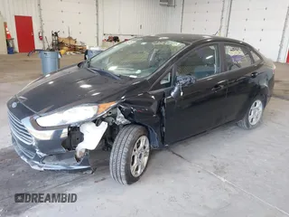 2016 Ford Fiesta SE z VIN 3FADP4BJ5GM151066, wystawiony jako IAAI lot #42200928 z przebiegiem 105 004 mil mil oraz . Historia ofert i sprzedaży dostępna na DreamBid. Obrazek 2.