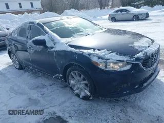 2016 Mazda 6 i Sport with VIN JM1GJ1U53G1407290, listed as a IAAI auction lot 41579668 with 131,527 mi miles and . Bid and sale history available at DreamBid. Image 1.