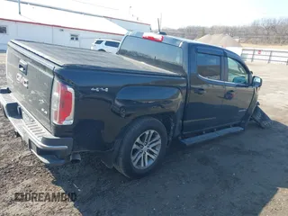 2015 GMC Canyon 4WD SLE with VIN 1GTG6BE36F1239678, listed as a IAAI auction lot 41705879 with 149,851 mi miles and . Bid and sale history available at carsss.com. Image 4.