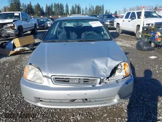 1997 Honda Civic DX with VIN 1HGEJ6223VL095214, listed as a IAAI auction lot 41560717 with 257,409 mi miles. Bid and sale history available at carsss.com. Image 12.