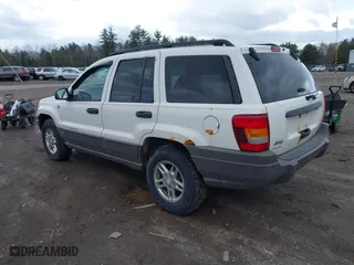 2004 Jeep Grand Cherokee Laredo with VIN 1J4GW48S54C393518, listed as a IAAI auction lot 41984570 with 187,066 mi miles. Bid and sale history available at carsss.com. Image 3.