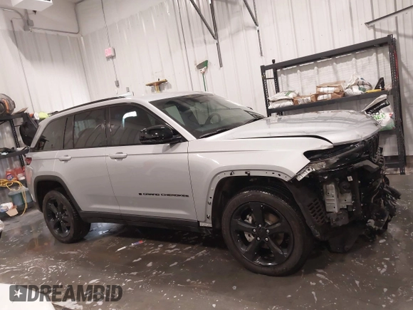 2023 Jeep Grand Cherokee Altitude with VIN 1C4RJHAGXP8882546, listed as a IAAI auction lot 41794805 with 17,071 mi miles and . Bid and sale history available at DreamBid. Image 14.