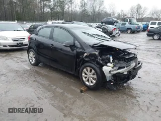 2012 Kia Rio EX with VIN KNADN5A39C6013756, listed as a IAAI auction lot 41560330 with 157,365 mi miles. Bid and sale history available at carsss.com. Image 1.