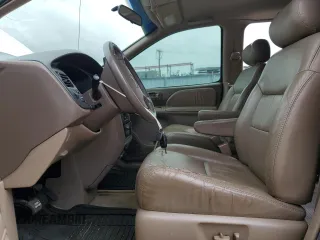 1999 Toyota Sienna LE with VIN 4T3ZF13C4XU134680, listed as a Copart auction lot 74044544 with 127,954 mi miles and Clean Title. Bid and sale history available at carsss.com. Image 7.