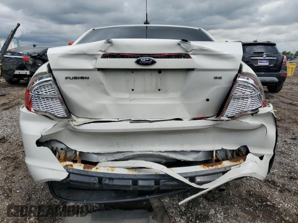 2012 Ford Fusion SE z VIN 3FAHP0HA1CR353093, wystawiony jako Copart lot #57113615 z przebiegiem 120 769 mil mil oraz Szkoda całkowita • Salvage title. Historia ofert i sprzedaży dostępna na DreamBid. Obrazek 6.