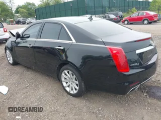 2014 Cadillac CTS AWD z VIN 1G6AW5SX6E0175566, wystawiony jako IAAI lot #42350632 z przebiegiem 41 610 mil mil oraz . Historia ofert i sprzedaży dostępna na DreamBid. Obrazek 3.