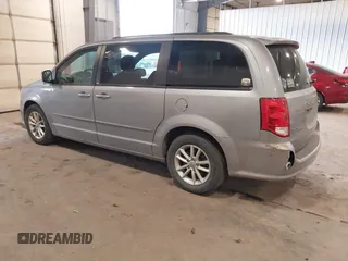 2014 Dodge Grand Caravan SXT with VIN 2C4RDGCG9ER213426, listed as a IAAI auction lot 41044553 with 175,140 mi miles and . Bid and sale history available at DreamBid. Image 3.
